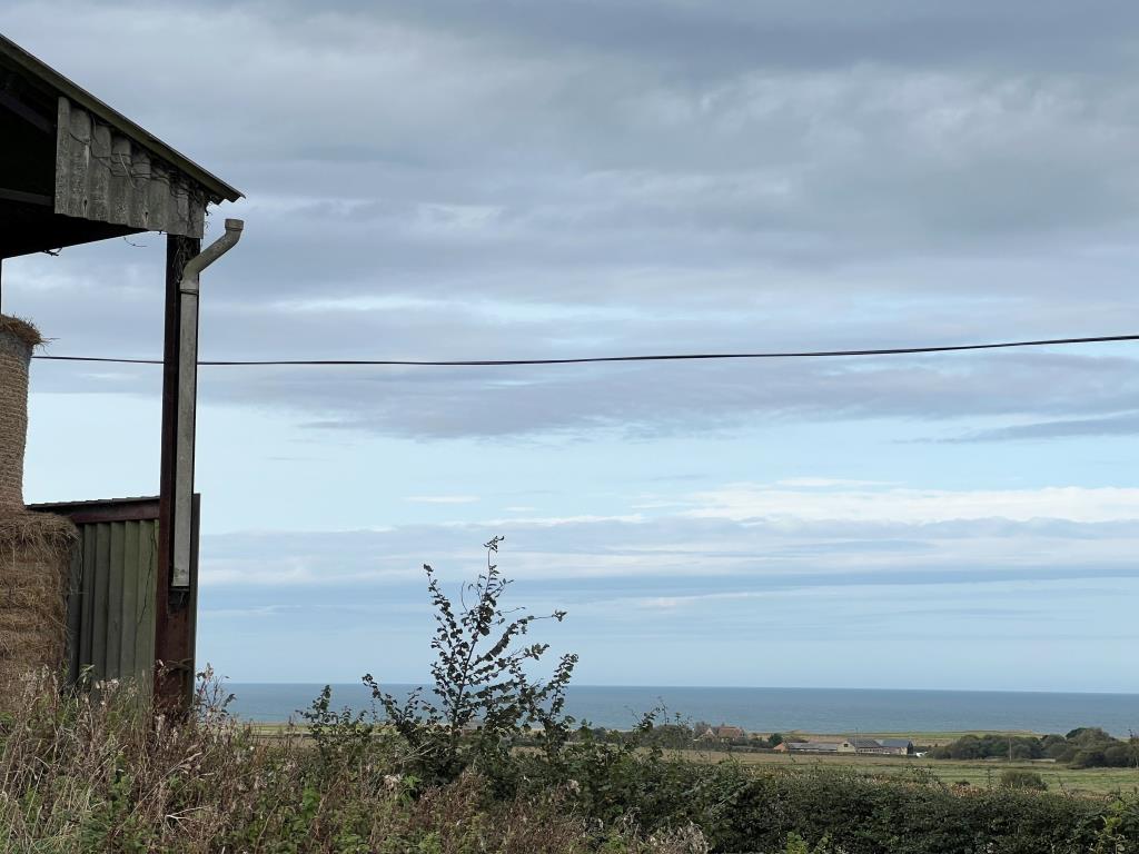 Lot: 133 - AGRICULTURAL BARN WITH POTENTIAL AND SEA VIEWS - Sea View looking towards the English Channel